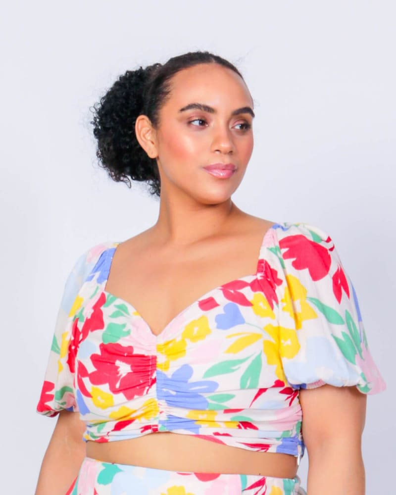 Front of a model wearing a size XL (16/18) Peaches Puff Sleeve Crop Top in Large Floral by LuvMeMore. | dia_product_style_image_id:266680